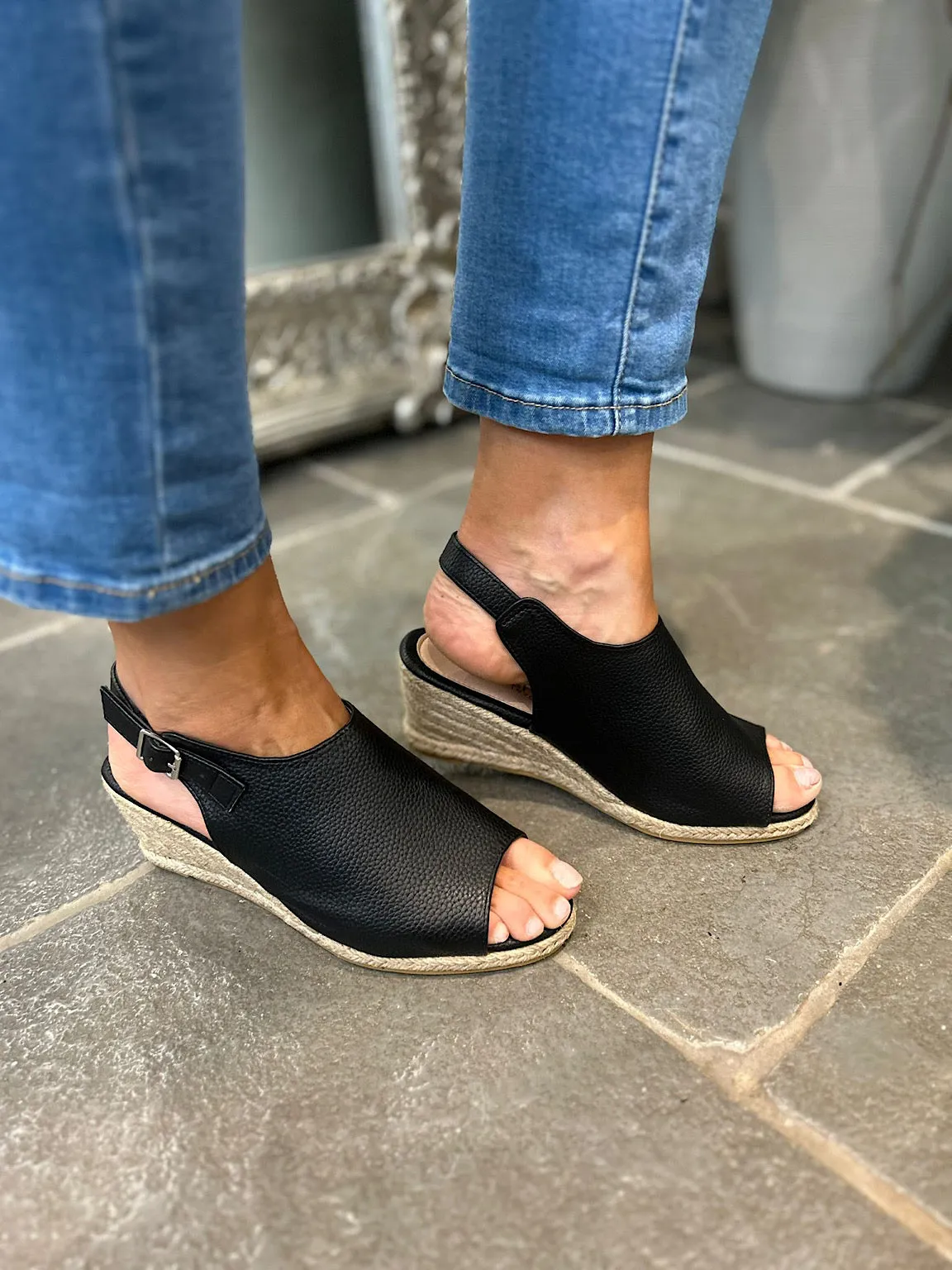 Black Strappy Wedge Sandals with Open Toe and Buckle Detail