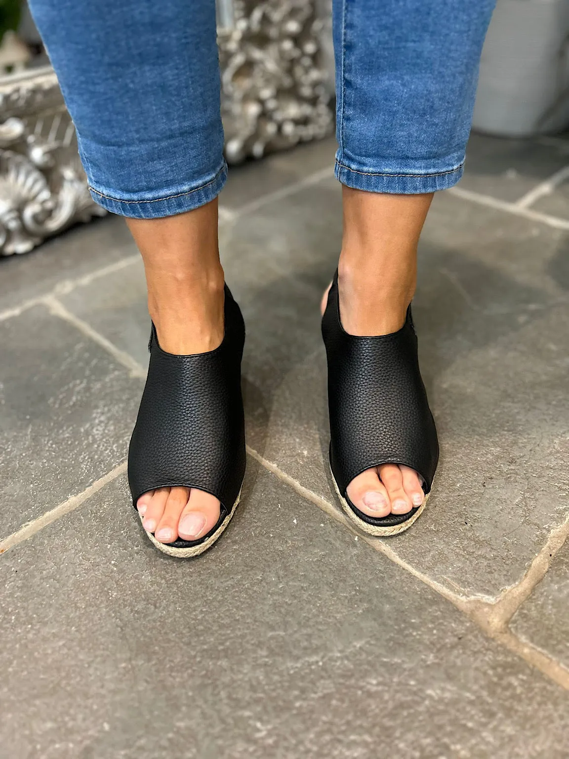 Black Strappy Wedge Sandals with Open Toe and Buckle Detail