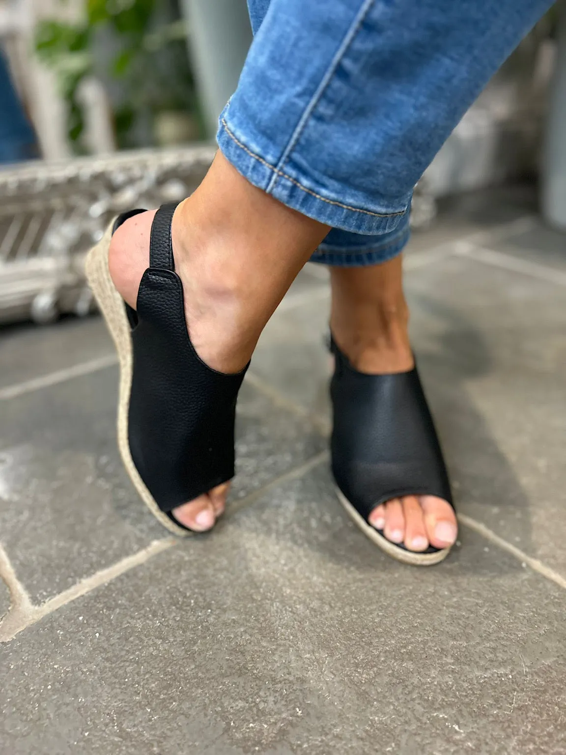 Black Strappy Wedge Sandals with Open Toe and Buckle Detail