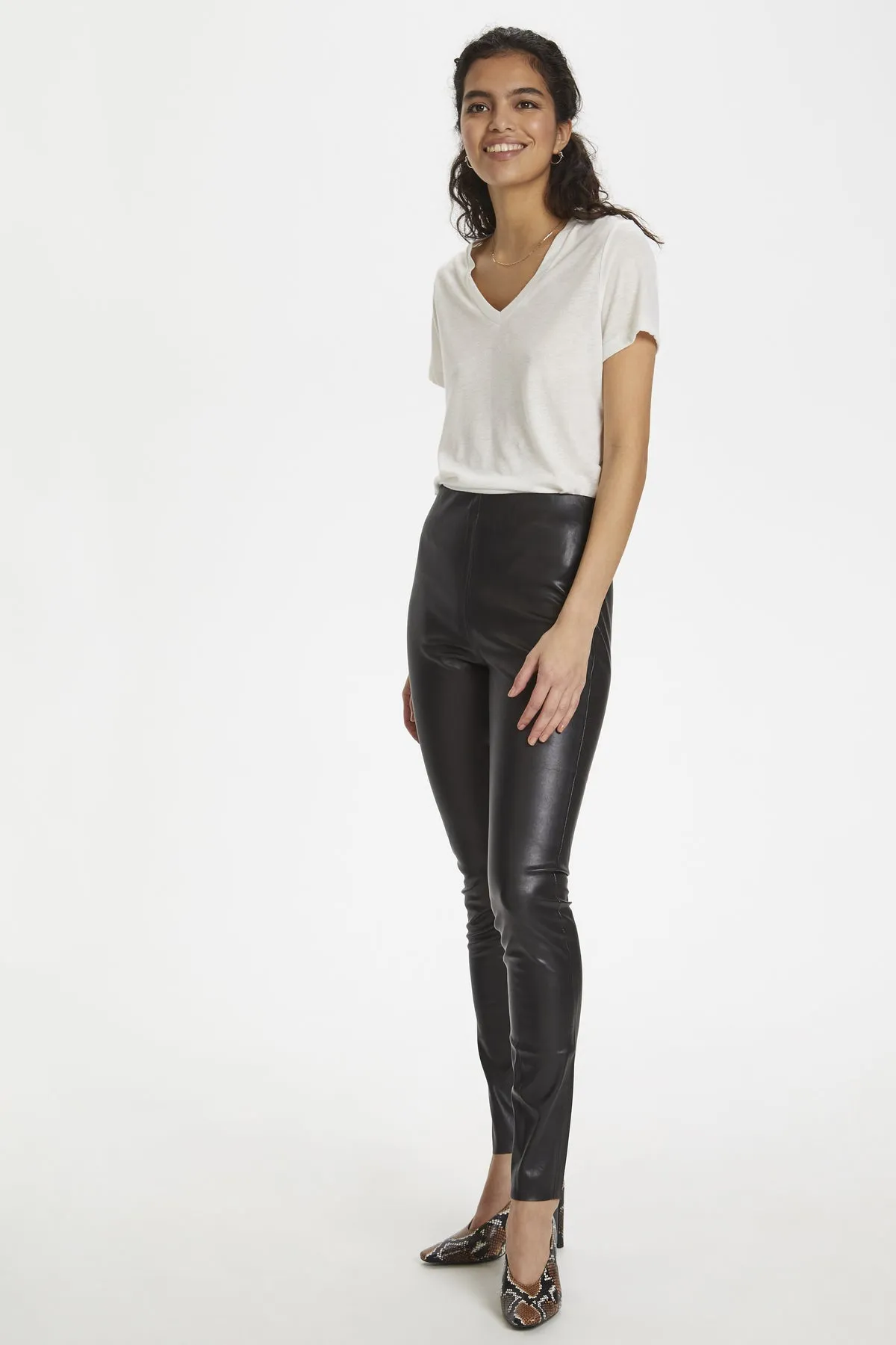 Faux leather leggings by Kaylee.