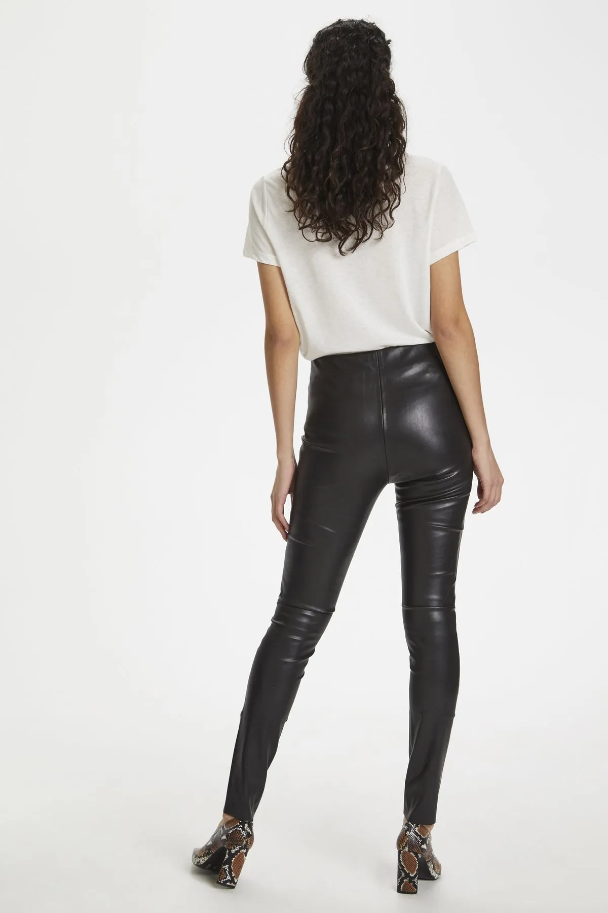 Faux leather leggings by Kaylee.