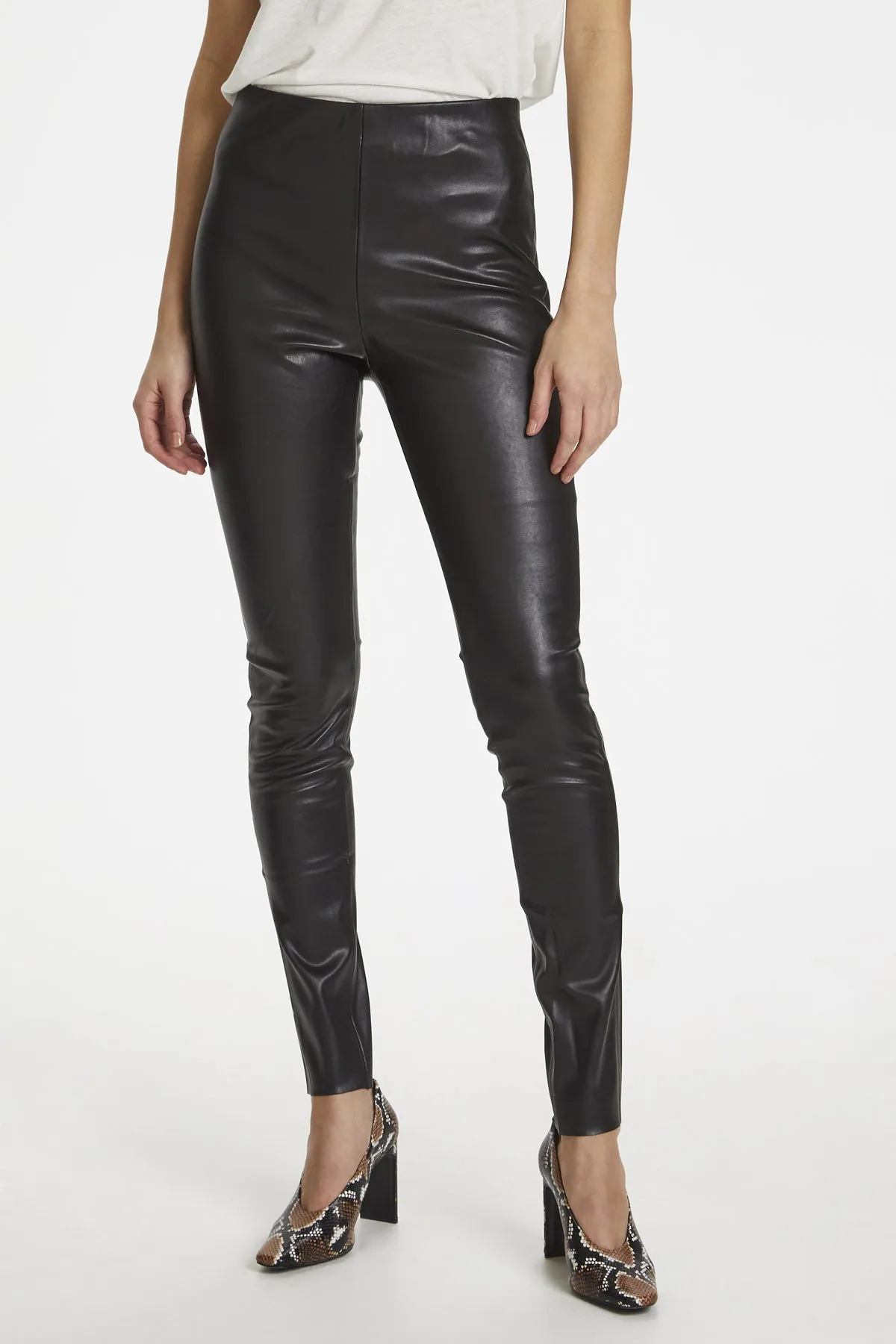 Faux leather leggings by Kaylee.