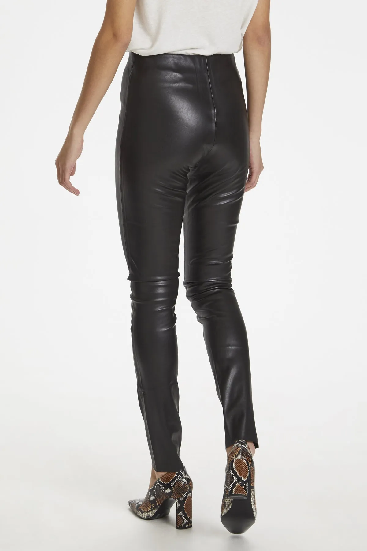 Faux leather leggings by Kaylee.