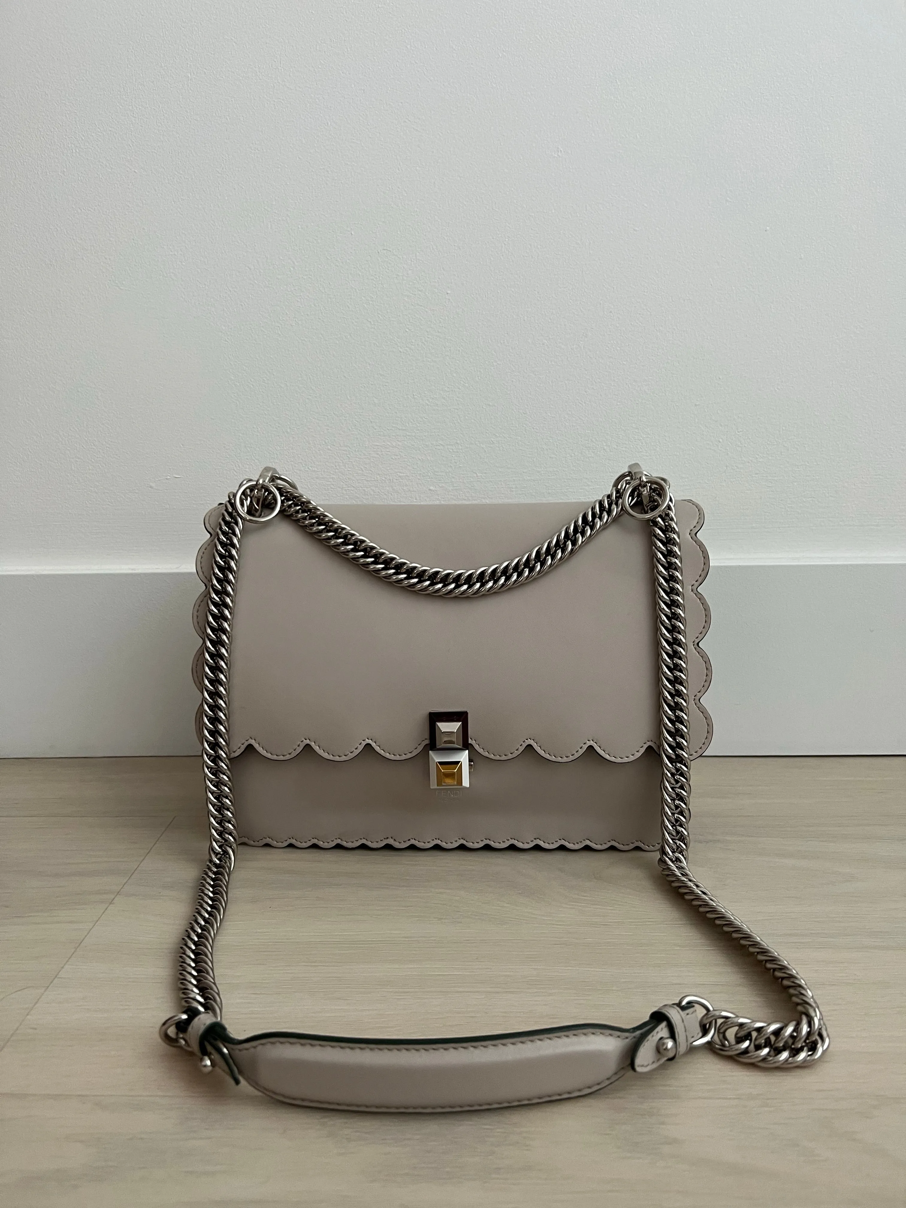 Fendi Scalloped Kan Bag can be rewritten as Fendi Scalloped Handbag.