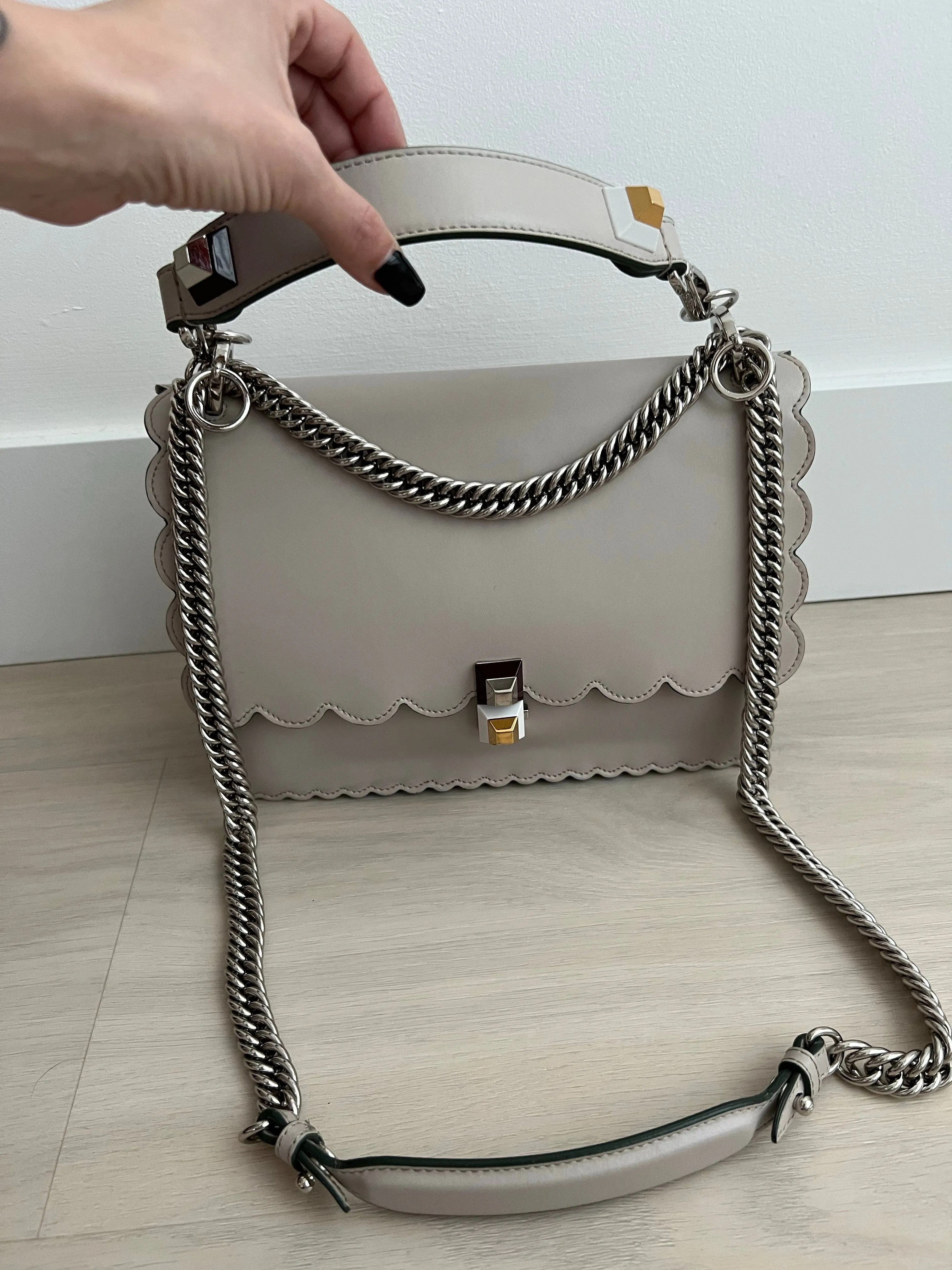 Fendi Scalloped Kan Bag can be rewritten as Fendi Scalloped Handbag.