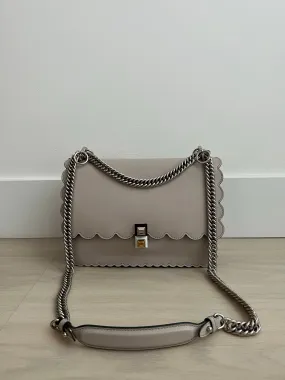 Fendi Scalloped Kan Bag can be rewritten as Fendi Scalloped Handbag.