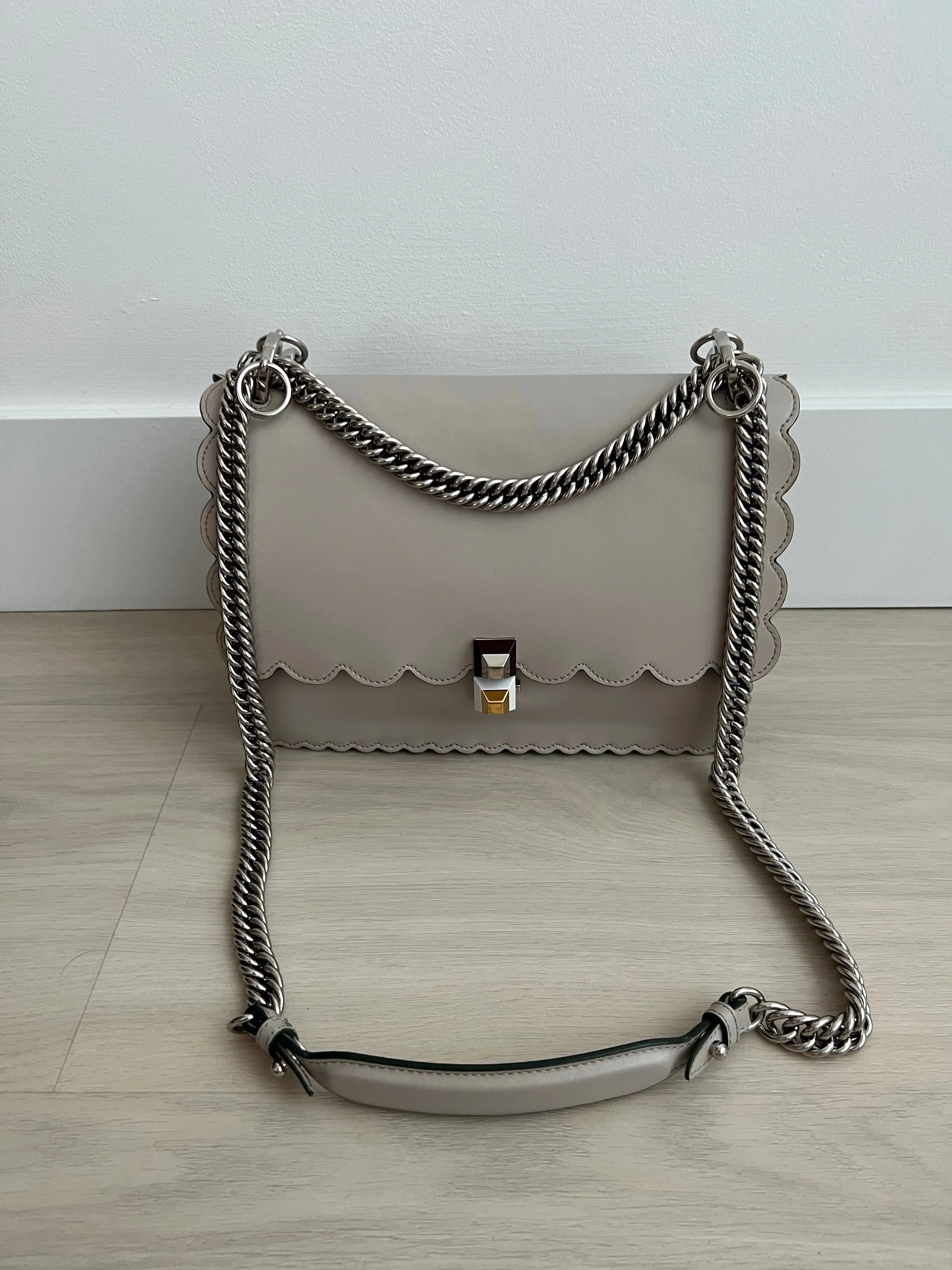 Fendi Scalloped Kan Bag can be rewritten as Fendi Scalloped Handbag.