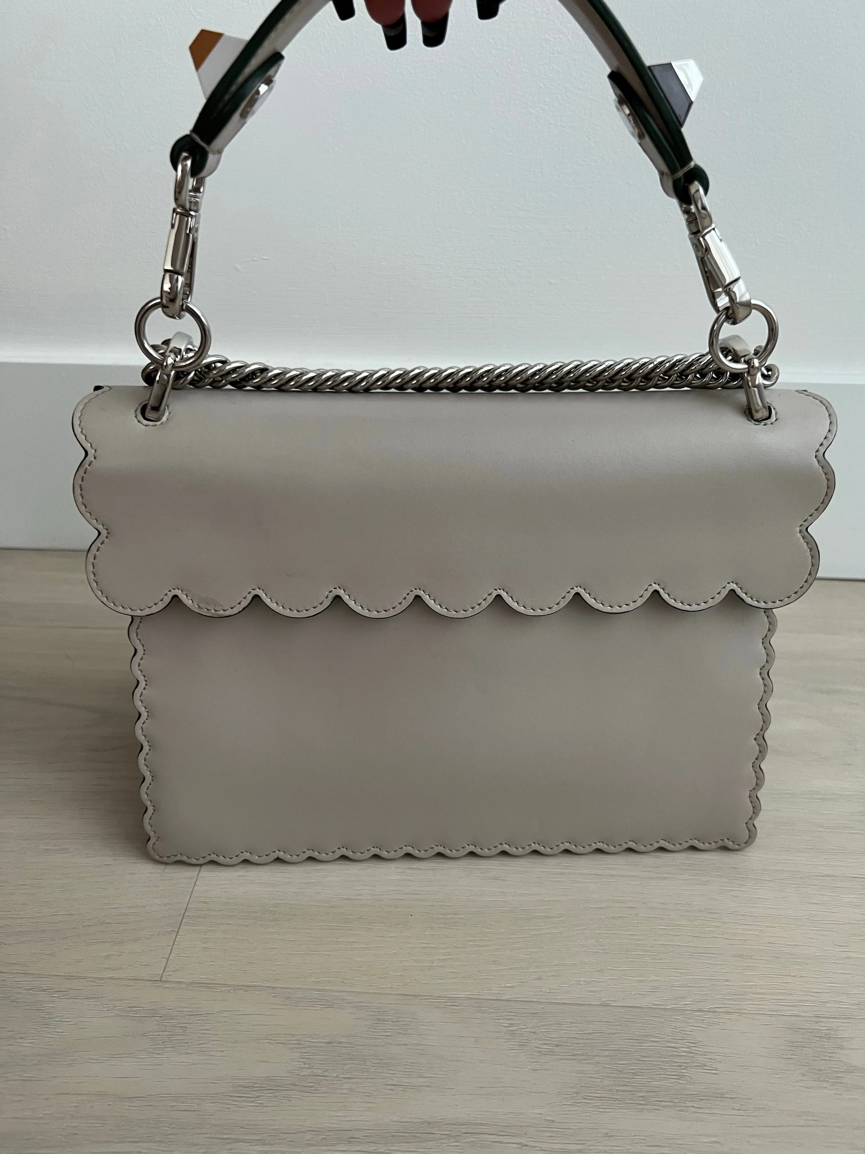 Fendi Scalloped Kan Bag can be rewritten as Fendi Scalloped Handbag.