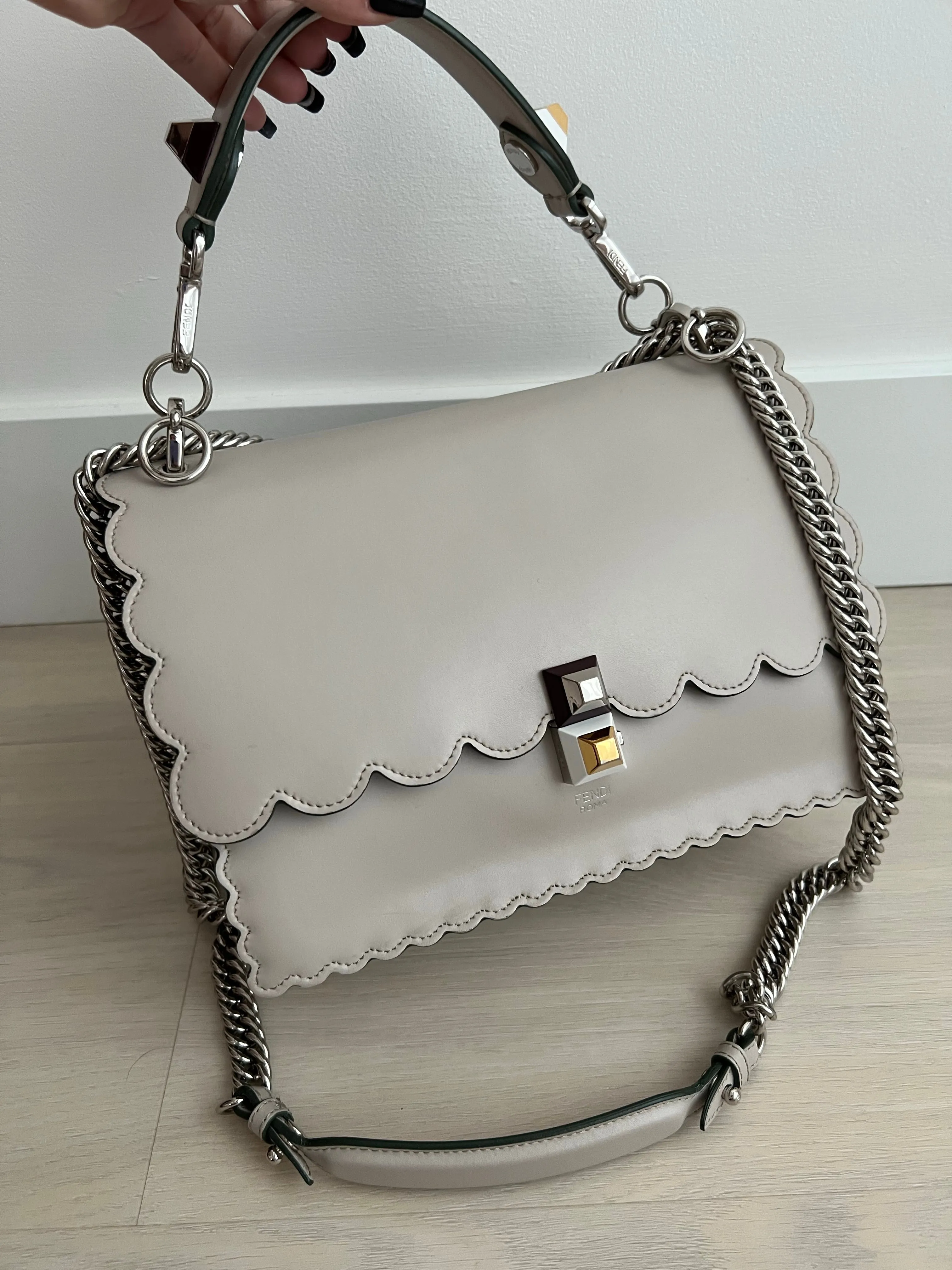 Fendi Scalloped Kan Bag can be rewritten as Fendi Scalloped Handbag.