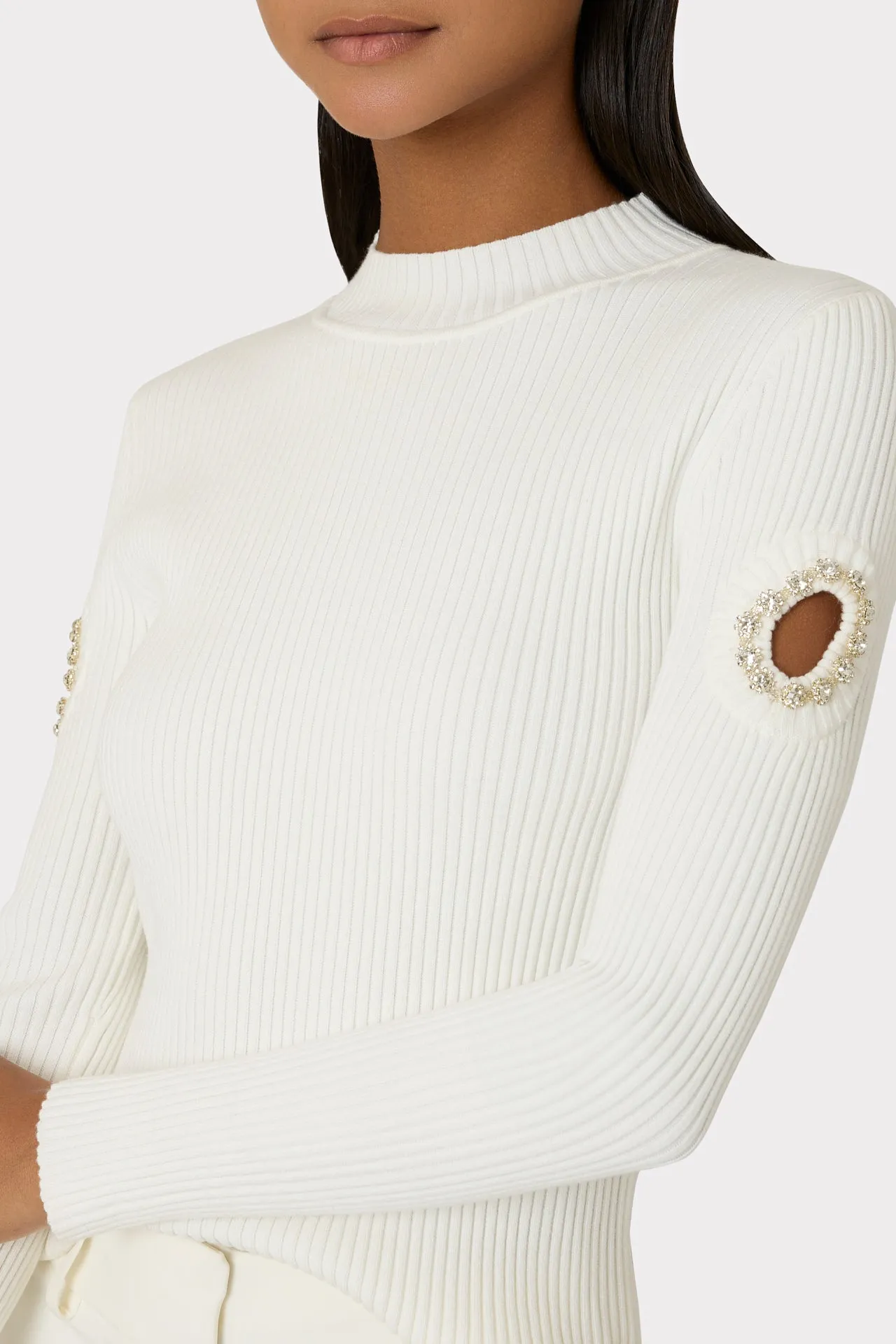 Knit Mock Neck sweater with shoulder cutouts.