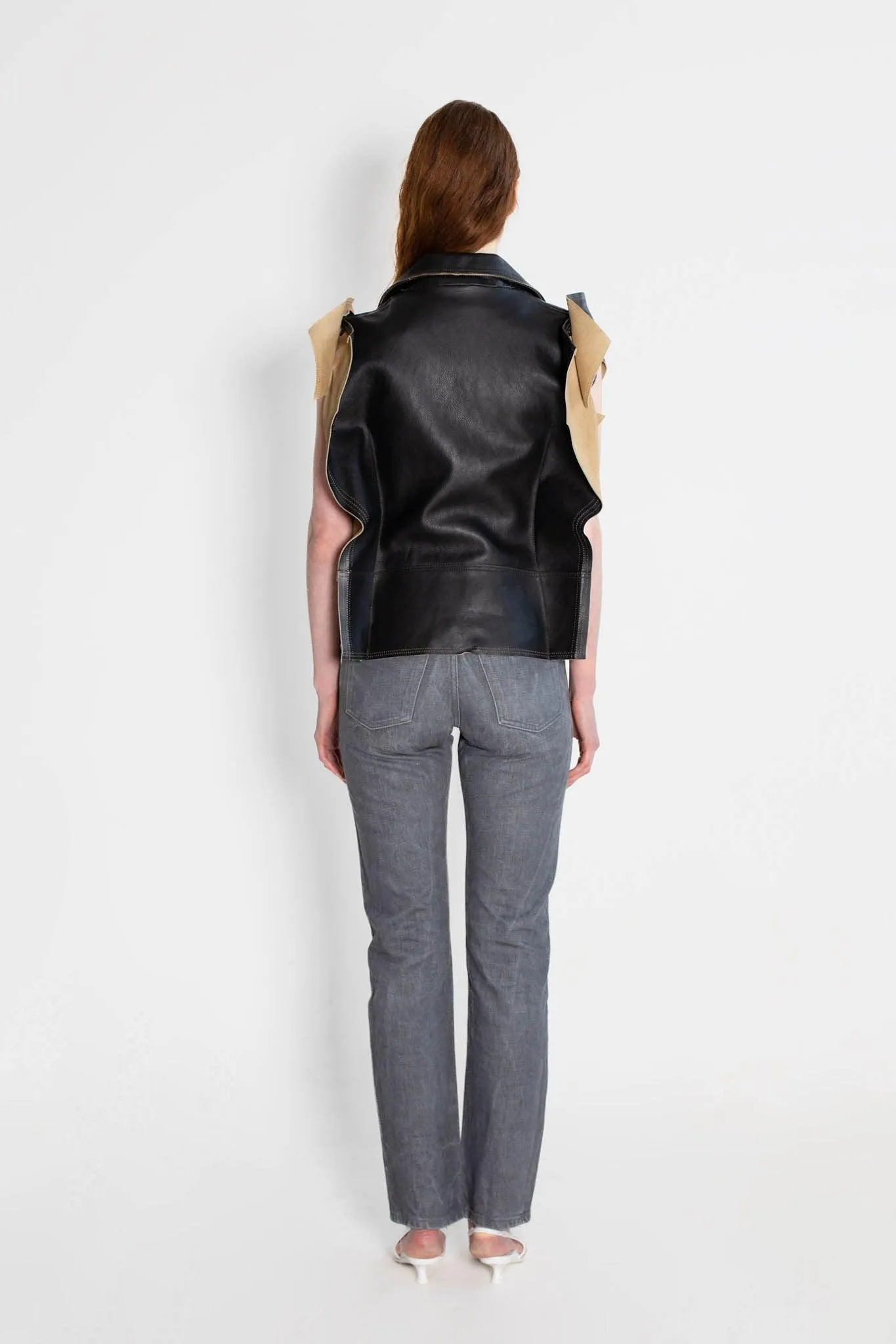 Maison Martin Margiela Leather Jacket can be rewritten as Designer Leather Jacket by Maison Martin Margiela.