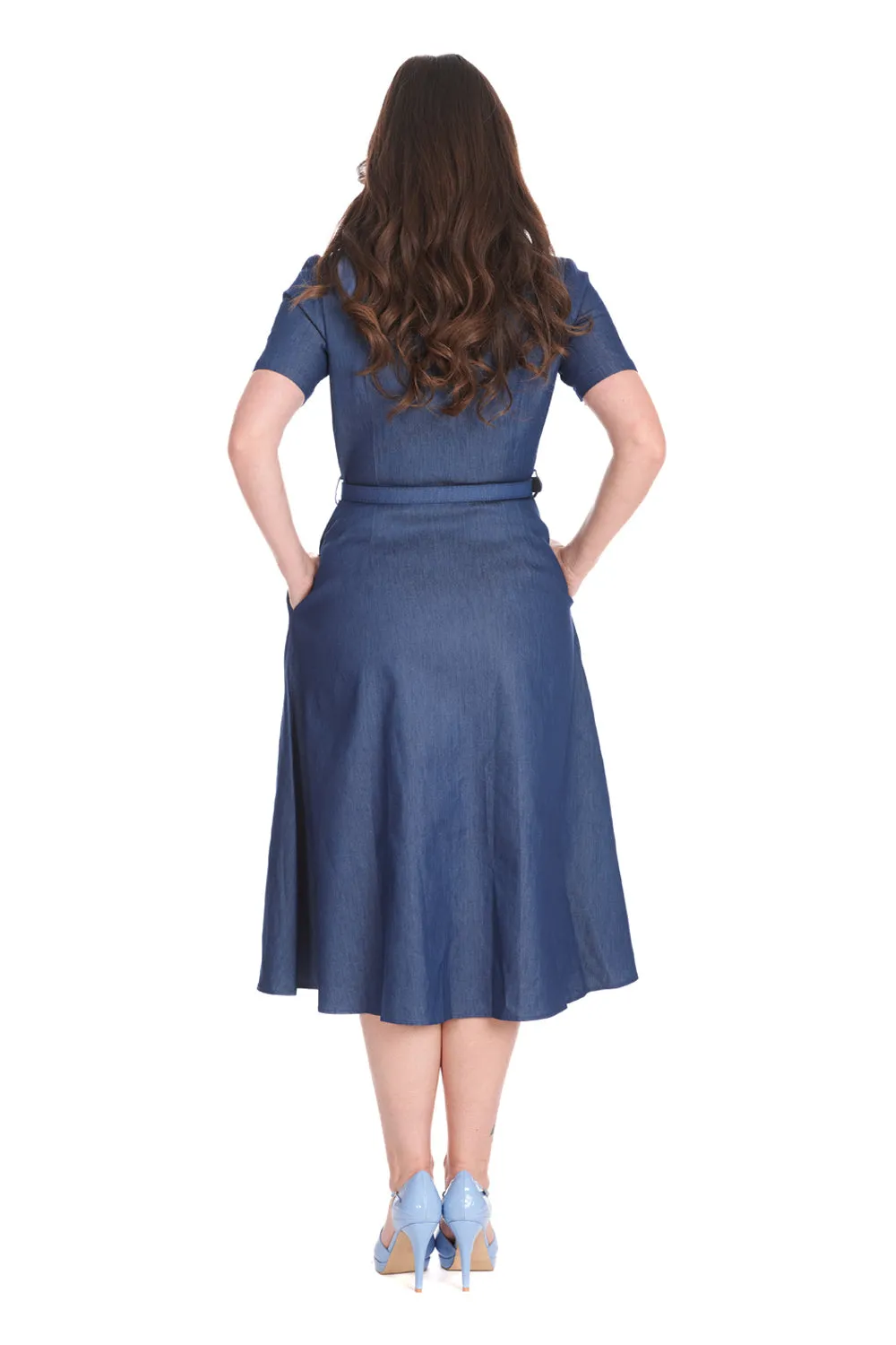 Ladies' sleeveless light blue denim dress with side pockets.